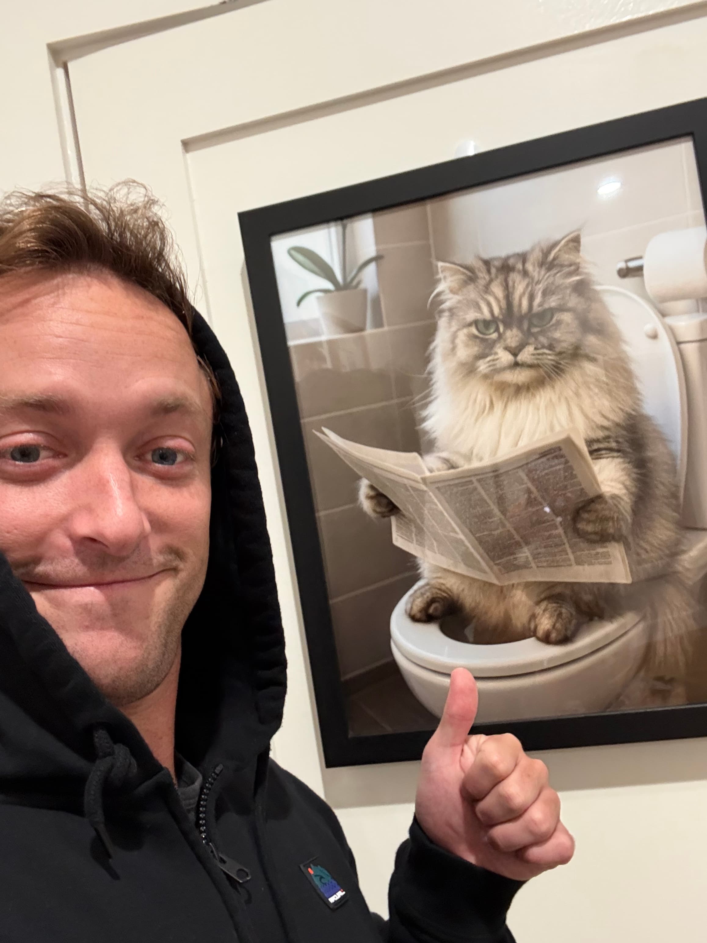 Peso pawtrait framed on the wall